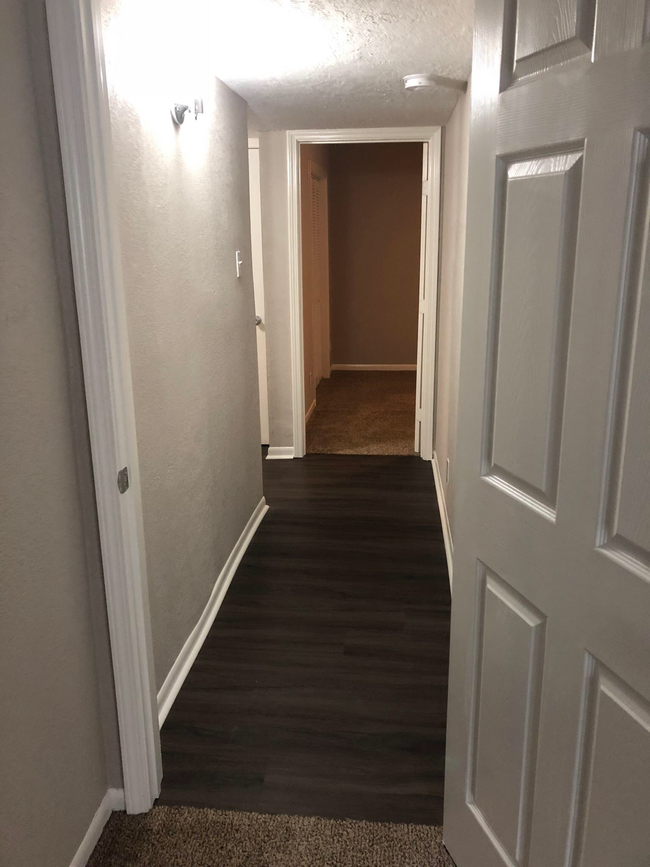 Hallway separating bedrooms - 1822 Avenue M 1/2