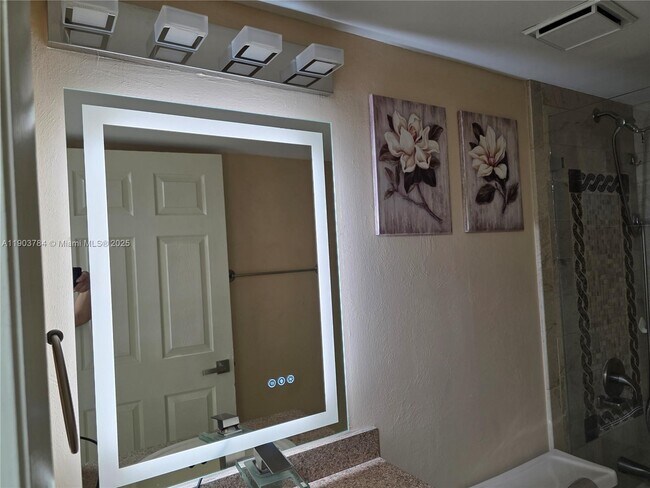 Building Photo - 9917 W Okeechobee Rd