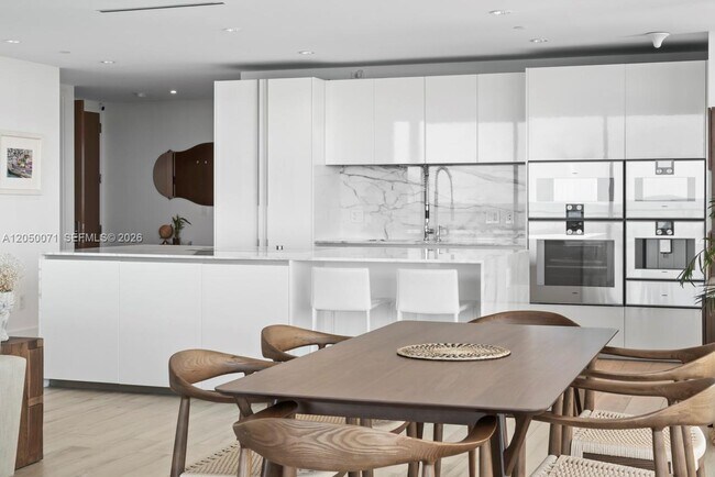 Building Photo - 10203 Collins Ave