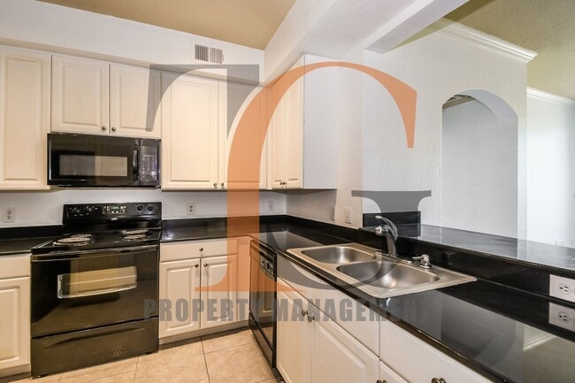 Building Photo - 2/2 Condo in the Gated Community of Villa ...