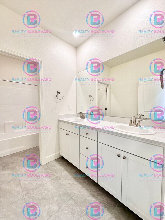 Building Photo - Modern Elegance: Stunning  New 4-Bedroom Home with Chef’s Kitchen & Dual Living Spaces