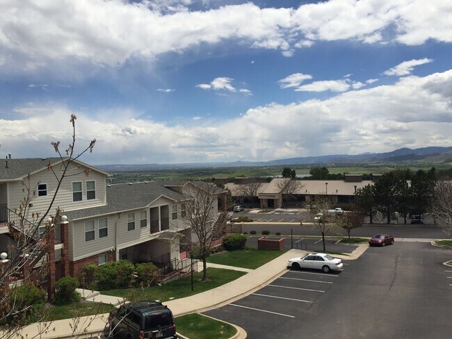 Building Photo - Available Now- 2 Bed/2 Bath Top Floor Condo with Covered Garage Space and Additional Storage