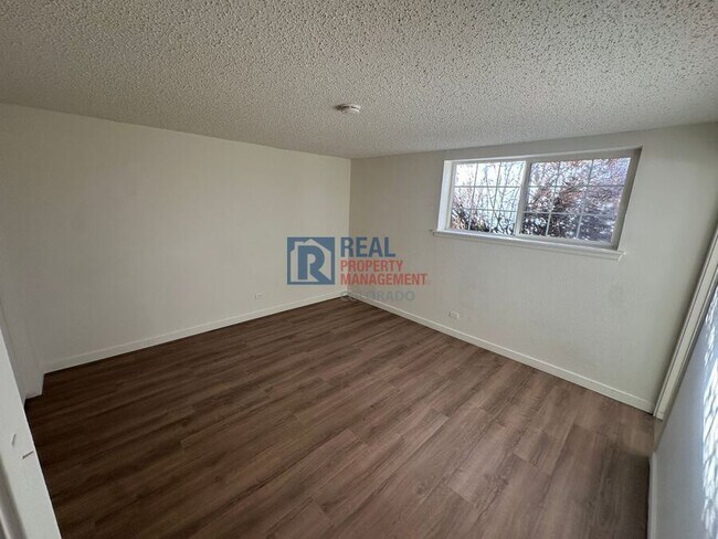 Building Photo - 9110 E Girard Ave