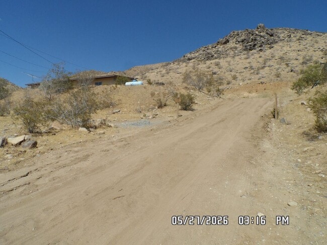 Building Photo - 2 Bedrooms, 1.5 Bathrooms, 2 Car Garage, 973 sq. ft., View of Victor Valley, Storage Shed