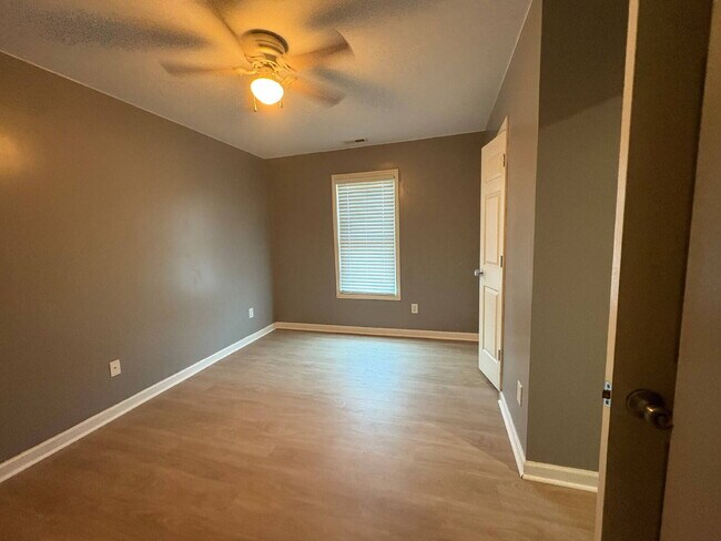 Building Photo - Spacious 4-Bedroom Sanctuary with Cozy Fireplace on Chimney Swift Drive!