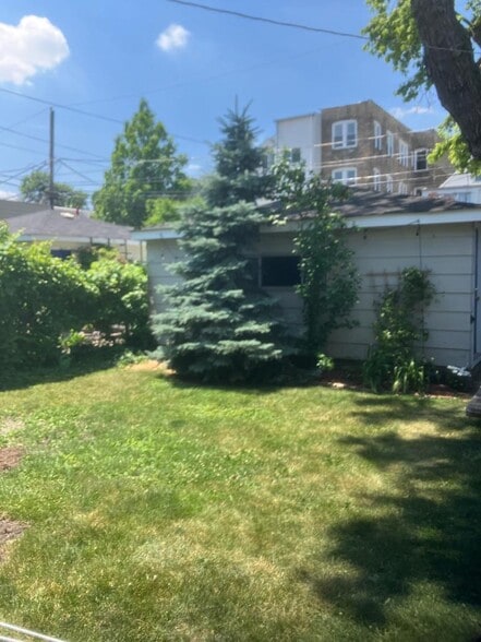 Back yard and 2 car garage - 2440 N Mozart St