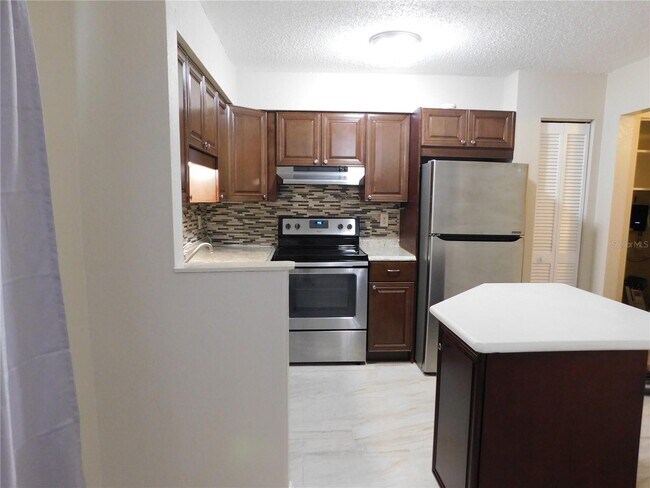 Building Photo - "Charming 1-Bedroom with Granite Touches in Port Charlotte!"