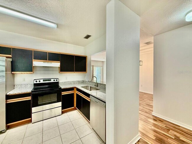 Building Photo - 6014 Portsdale Pl