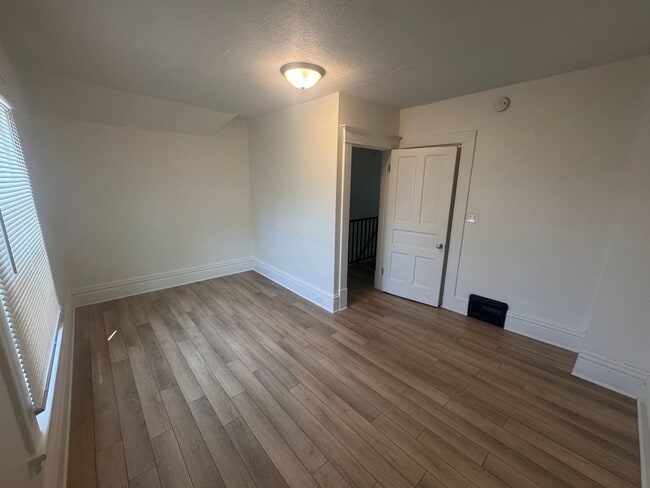 Building Photo - Updated Three Bedroom Home on the NE side ...