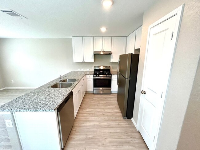 Building Photo - *COMING SOON* Modern Two-Story Home with Garage & Fenced Yard!