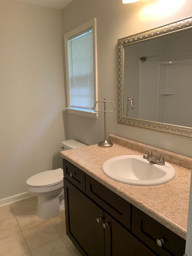 Building Photo - Yorktown Place-Gated Townhome Community-Tibet Ave.