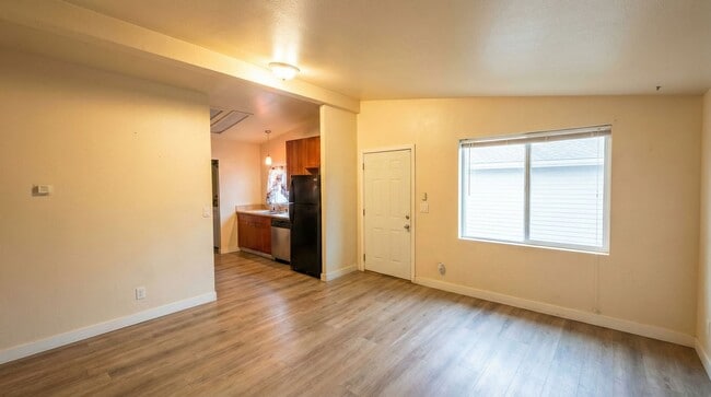 Building Photo - Utilities Paid: 3 Bed Laurel District Apartment with Modern Updates