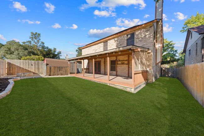 Building Photo - Sign your lease and receive a FREE 50" TV!!!  "Spacious 4-Bedroom Retreat with Fireplace in Charm...