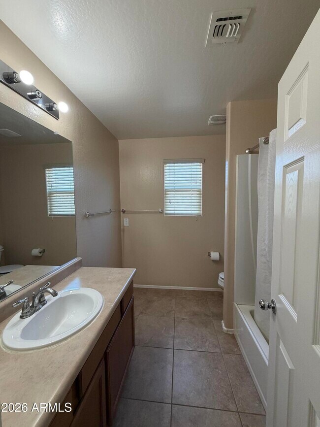 Building Photo - 4723 W Gelding Dr