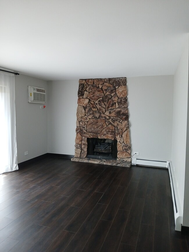 Decorative fireplace in livingroom and thru the wall air conditioner - 15820 Orlan Brook Dr