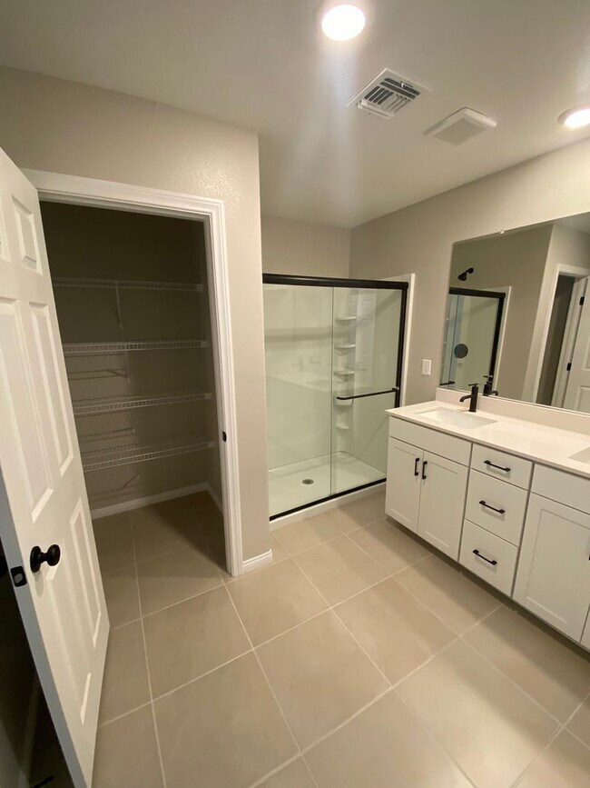 Building Photo - Americana Property Mgmt - 2022 built 4 bedrooms in prime South West Las Vegas