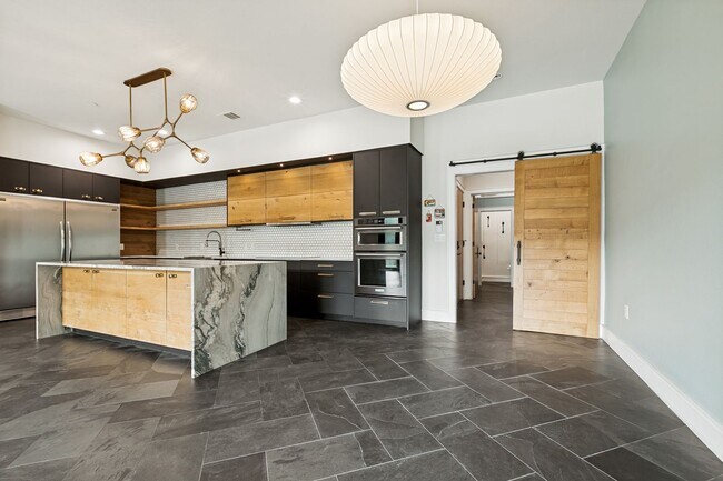 Building Photo - LUXURY TOWNHOME IN LONE STAR DISTRICT