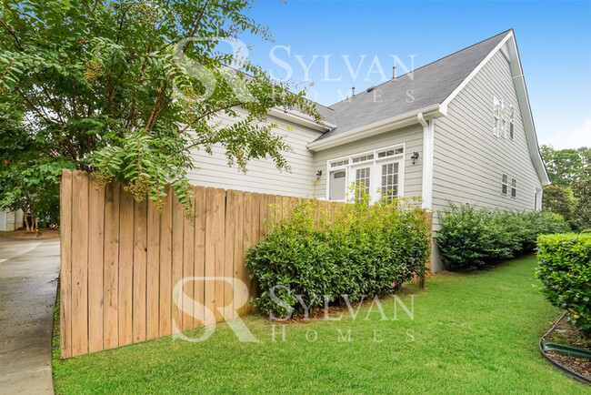 Building Photo - Welcome to this charming abode.