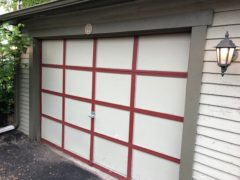 One car garage plus two off-street parking spaces included. - 22 S Spring Ave