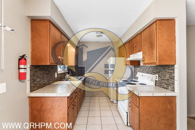 Building Photo - Available Now! Carmen Ainsworth Schools - Water included - SIDE BY SIDE DUPLEX