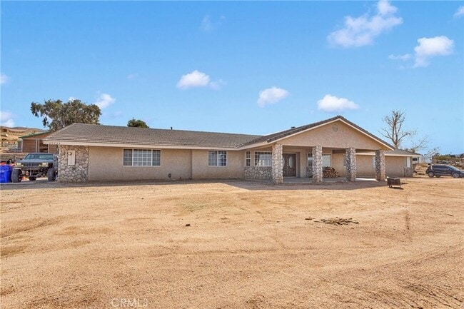 Building Photo - 25733 Roundup Way