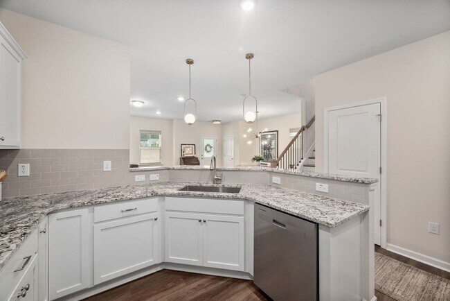 Building Photo - Stunning 3BD, 2.5BA End-Unit Fuquay-Varina Townhome with a 2-Car Garage in a Prime Location Near ...