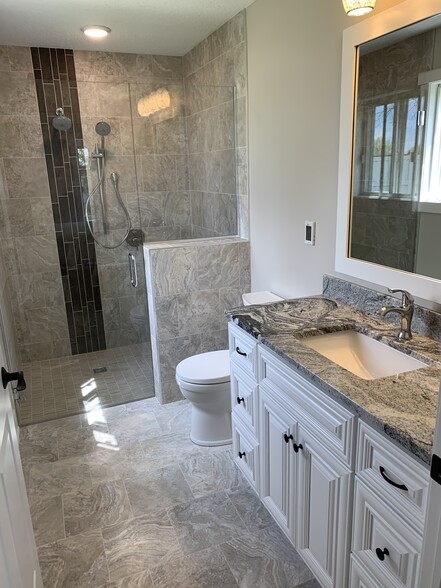 Heated floors, granite vanity top and new fixtures throughout - 9057 Prairieview Ln N