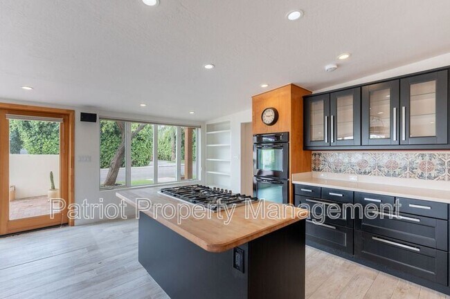 Building Photo - 7024 E Orange Blossom Ln