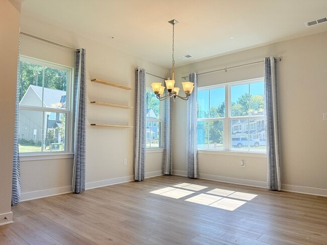 Building Photo - Coastal Luxury Living in River Run – Minut...