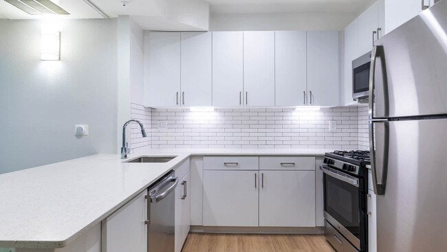 Kitchen with Stainless Steel Appliances - Academy Village