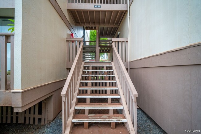 Building Photo - This 2 bedroom, 1 bathroom unit is on the 2nd story in the Makaha Valley Plantation condos. It is...