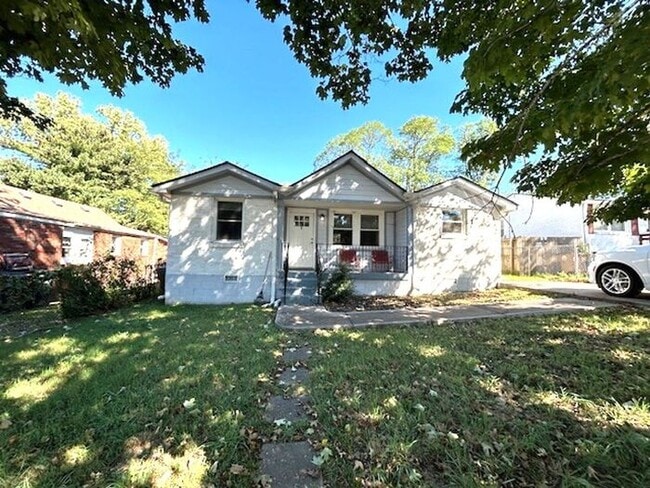 Primary Photo - Brick 3 bedroom, 2 bath ranch style home, Updated kitchen, Open floor plan, Deck