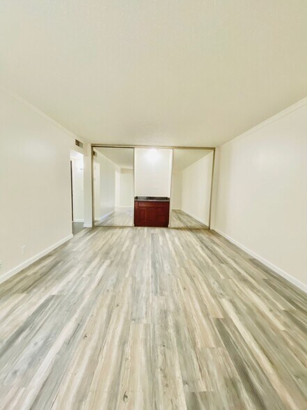 Living with mini bar and storage - 350 N Civic Dr