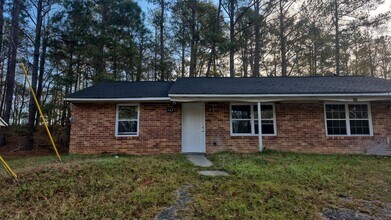 Building Photo - Clean 2BR/1BA with Newer Floors — Available Now
