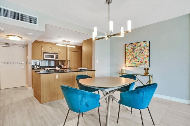 Building Photo - 10275 Collins Ave