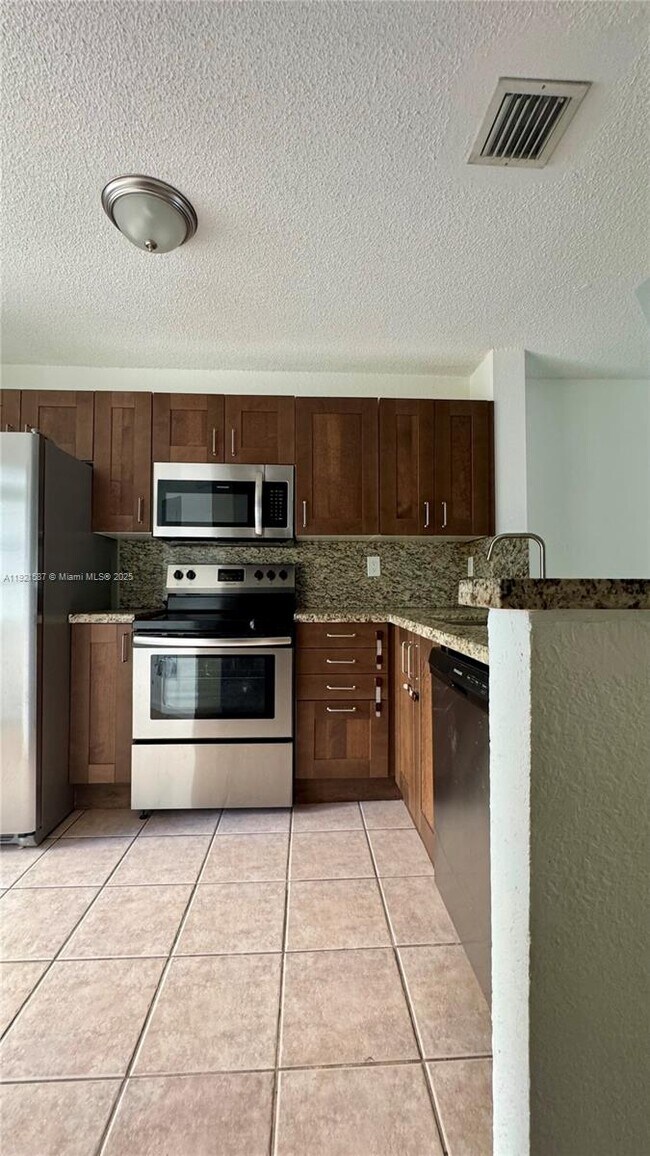 Building Photo - 12124 SW 143rd Ln