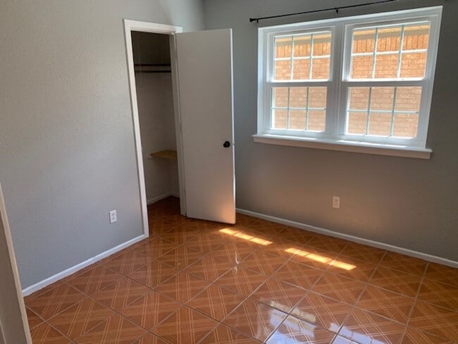 Building Photo - Southwest Lubbock Clean 3/2/2 with nice yard!
