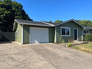 Building Photo - Beautifully Landscaped Two Bedroom
