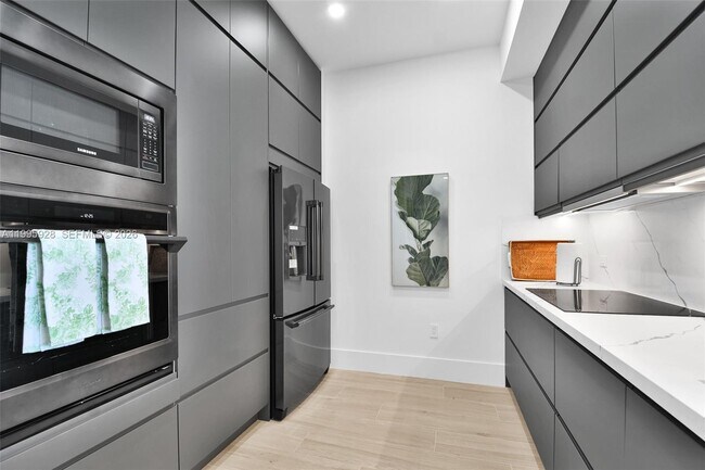 Building Photo - 18800 NE 29th Ave