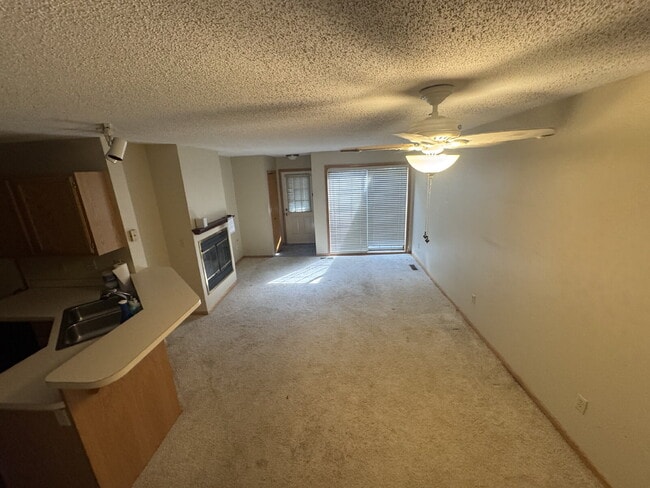 Building Photo - Charming 2-Bed Townhouse Retreat in Woodbury Spacious 1080 Sq Ft with 1 Bath.