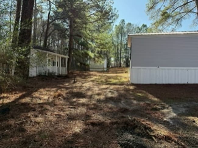 Building Photo - Private Setting/ Large Lot 3 bedroom 2 bath