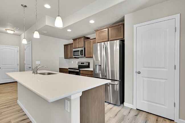 Building Photo - $2,040.95 -  3 bed, 2.5 bath Townhome in CO Springs with Central AC!