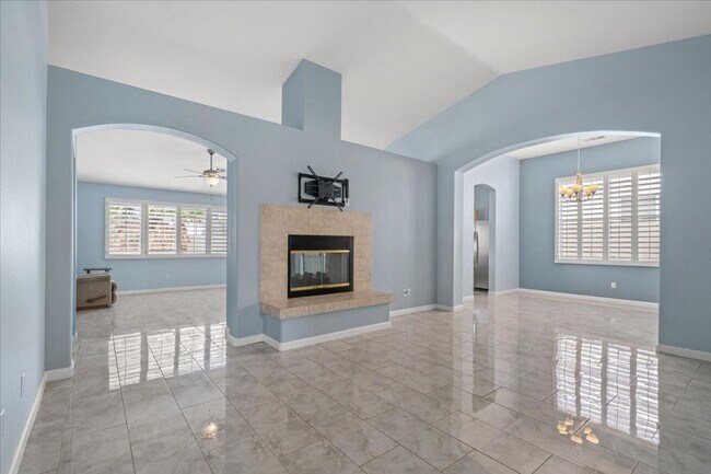 Building Photo - Multiple Living Areas 4-Bedroom Retreat with Vaulted Ceilings & No Carpet