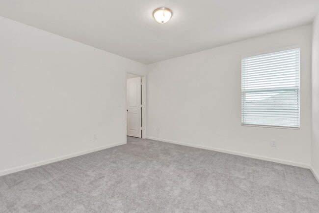 Building Photo - 7803 Carrotwood Ct