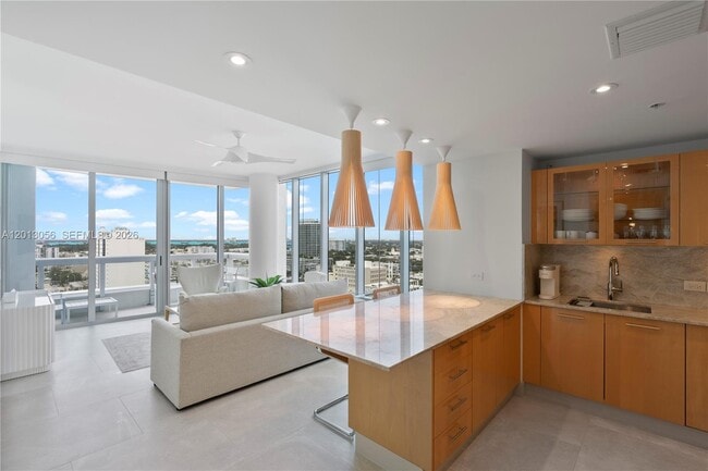 Building Photo - 6899 Collins Ave