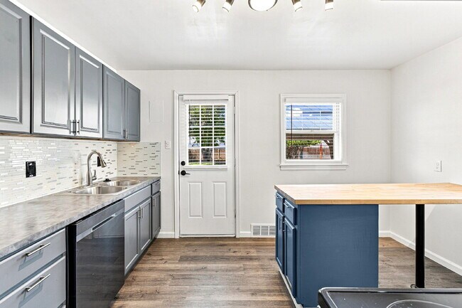 Building Photo - $1,545.95, 2-bed, 1-bath home in Brighton with a large fenced backyard.
