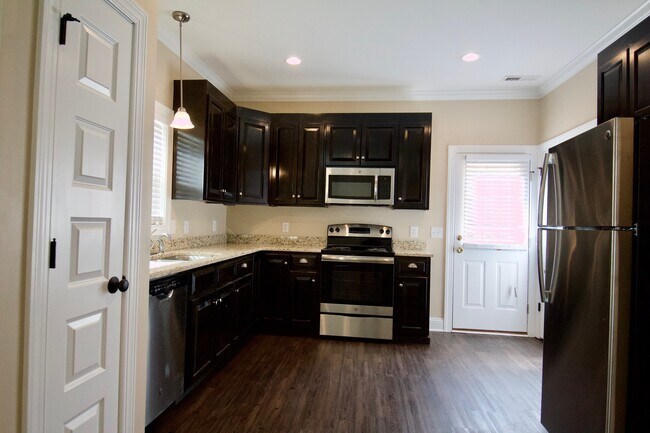 Building Photo - "Brand New Construction."  Quiet location, charming, cozy 3 bedroom duplex