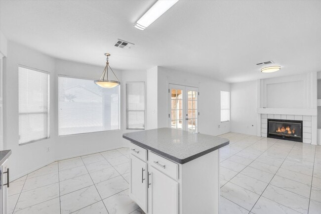 Building Photo - SE!!  Windmill and 215!! Newly remodeled!! All Tile Floors down stairs!! Low Maintenance Desert L...