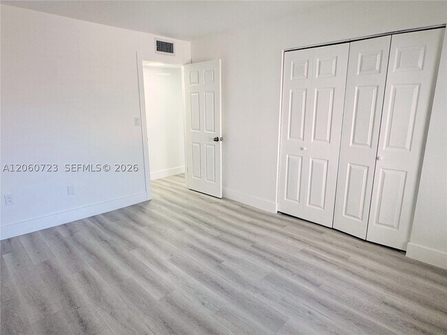 Building Photo - 6095 W 18th Ave