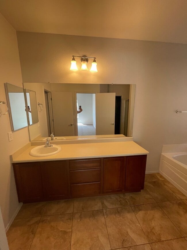 Building Photo - COMING SOON! Fireside at Norterra Spacious...